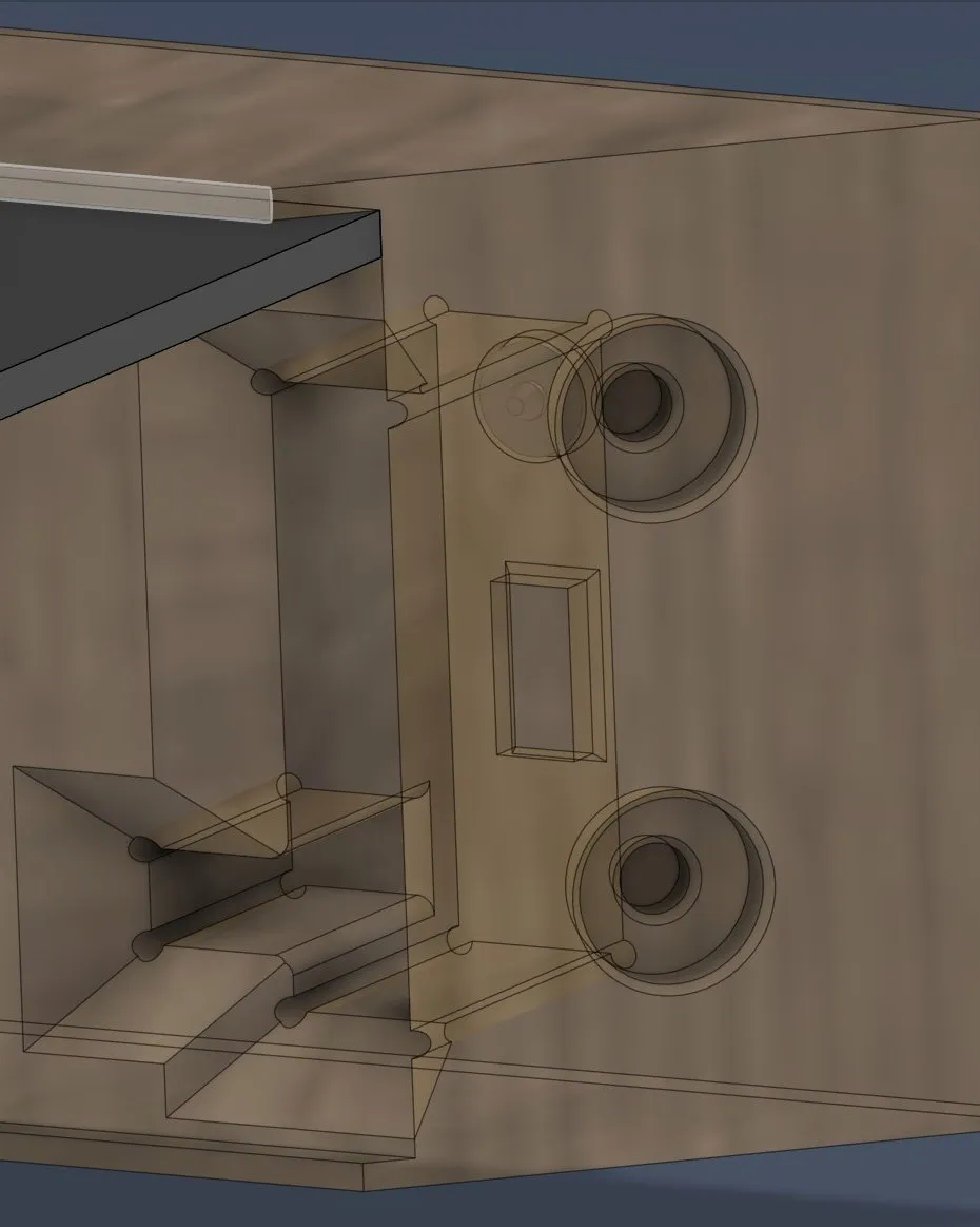 CAD x-ray view of the internal compartment with mounting bosses and a port cutout